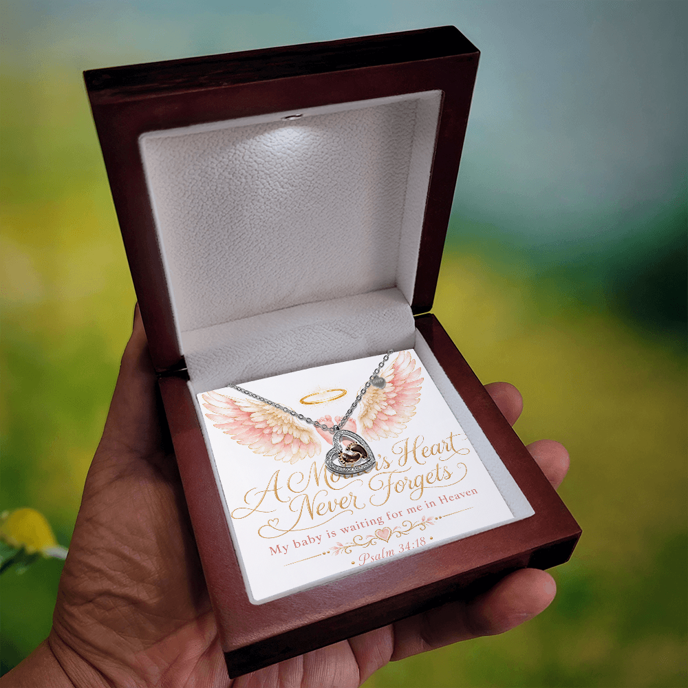 A Mother's Heart Never Forgets. A Baby is Waiting for Me in Heaven. Baby Feet Heart Necklace